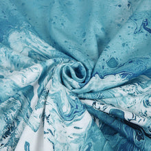 Ladda upp bild till gallerivisning, V-ringad miniklänning i blått tryck