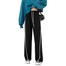 Ladda upp bild till gallerivisning, Damrandiga byxor med vida ben