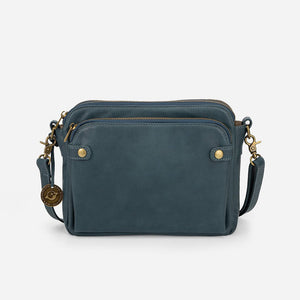 Crossbody axel och clutchväska i läder i tre lager