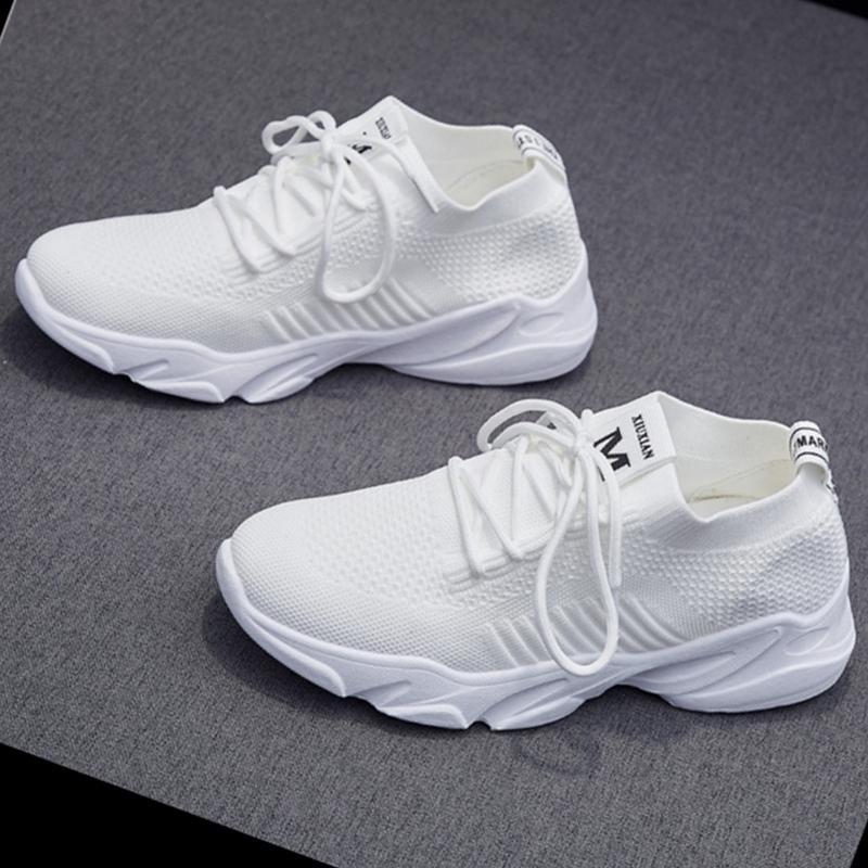 Nya andningsbara stickade sneakers