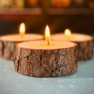 Ljusstake i form av en träpåle