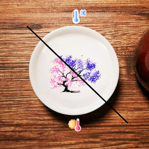 Magiska blommor som blommar te sakekopp, keramisk mugg som ändrar is/het färg