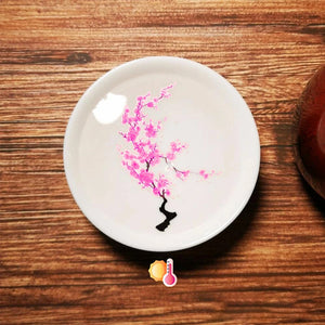 Magiska blommor som blommar te sakekopp, keramisk mugg som ändrar is/het färg