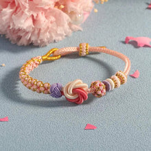 Ladda upp bild till gallerivisning, 🩷Till min dotter/barnbarnsdotter 🩷 - Armband med knut av persikoblommor
