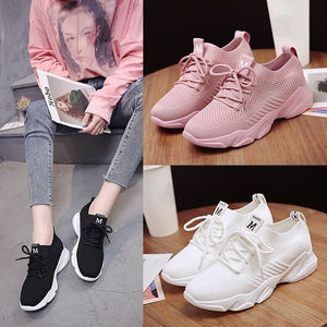 Nya andningsbara stickade sneakers