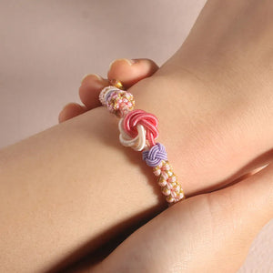 🩷Till min dotter/barnbarnsdotter 🩷 - Armband med knut av persikoblommor